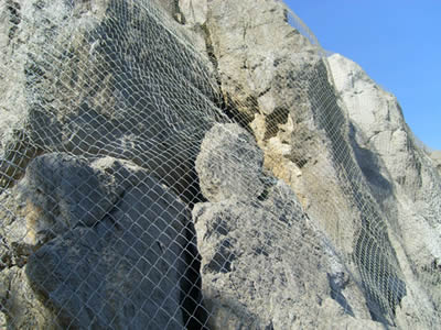 Chain link wire mesh netting is used to spread on the whole mountain surface.