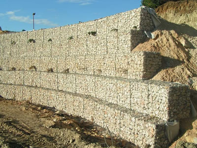 Galfan gabion baskets are placed in front of slope like a wall.