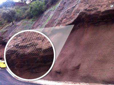 This slope contains two levels, the upper lever has hung with hexagonal wire mesh netting, the lower level has gone through shotcrete on rock and netting surface.