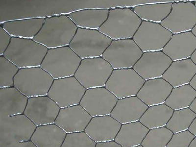 A piece of reverse twist unilateral hot dipped galvanized after weaving hexagonal mesh.